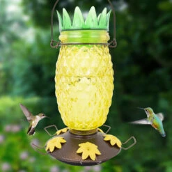 Perky-Pet Wild Bird 3.5 Lb Glass/Metal Top Fill Pineapple Bird Feeder 3 Ports -Grill Top Griddle Store 8039815 A V1.eps High 37058.1643230947